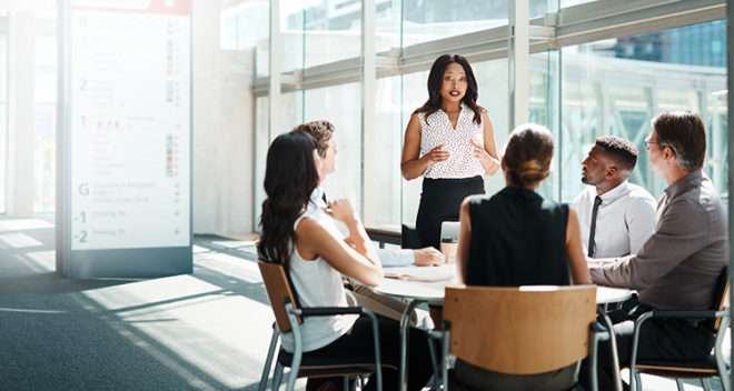 Group of businesspeople having a meeting in a modern office